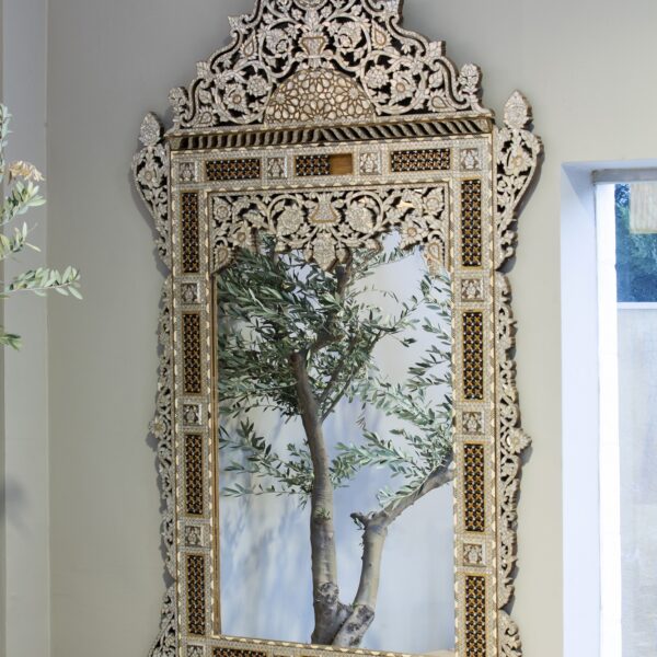alt="Wood and mother of pearl mirror"