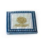 "Printed napkins, with turqouise and navy design and Arabic calligraphy on its border. The verse is written by the poet Al Mutanabi describing how people's true selves is shown in how generous they are. عَلى قَدرِ أَهلِ العَزمِ تَأتي العَزائِمُ
وَتَأتي عَلى قَدرِ الكِرامِ المَكارِم.  Napkin size 33x33cm when open, 3ply tissue, 20 napkins per pack."