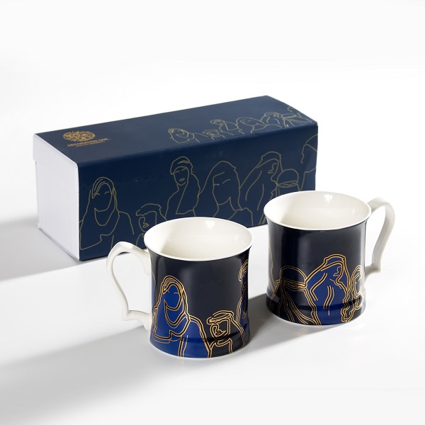 Faces and figures mug with gold writing and navy blue background calligraphy"