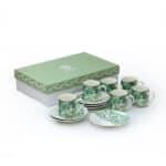 alt="porcelain turkish coffee cups with arabic calligraphy in green"